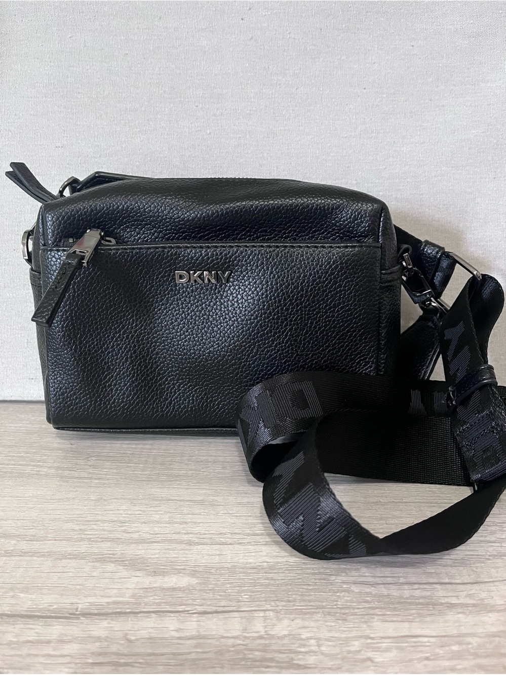 DKNY Black Pebbled Crossbody Bag with Branded Strap